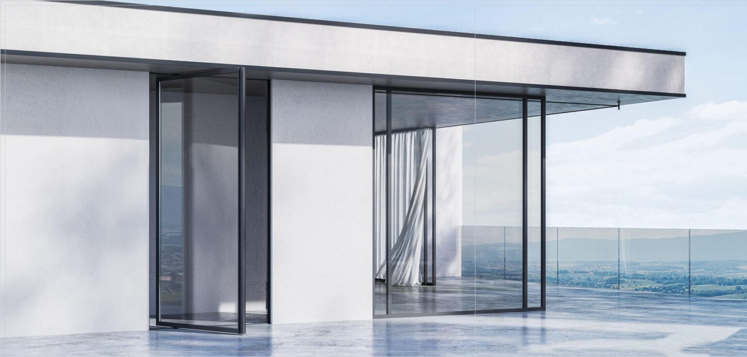 Aluminium pivot doors opening onto a terrace